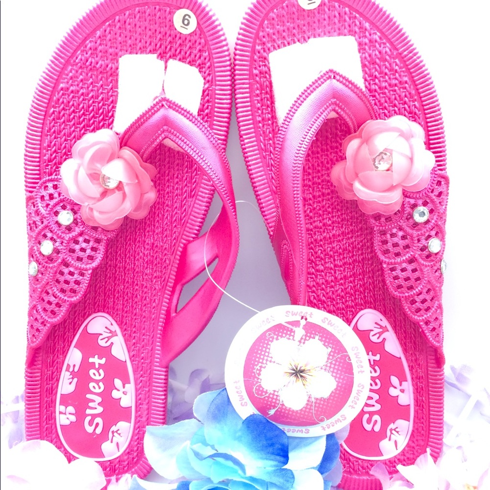 - Sweet rhinestone flip flops. New size 6